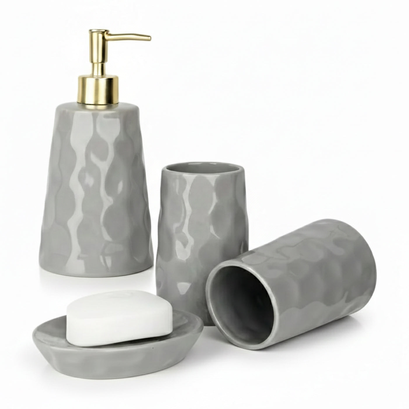 BosilunLife Bring Nature Inside grey recycled eco-clay 4-piece liquid bathroom set, featuring a dimpled soap dispenser with a gold pump, two tumblers, and a soap dish.