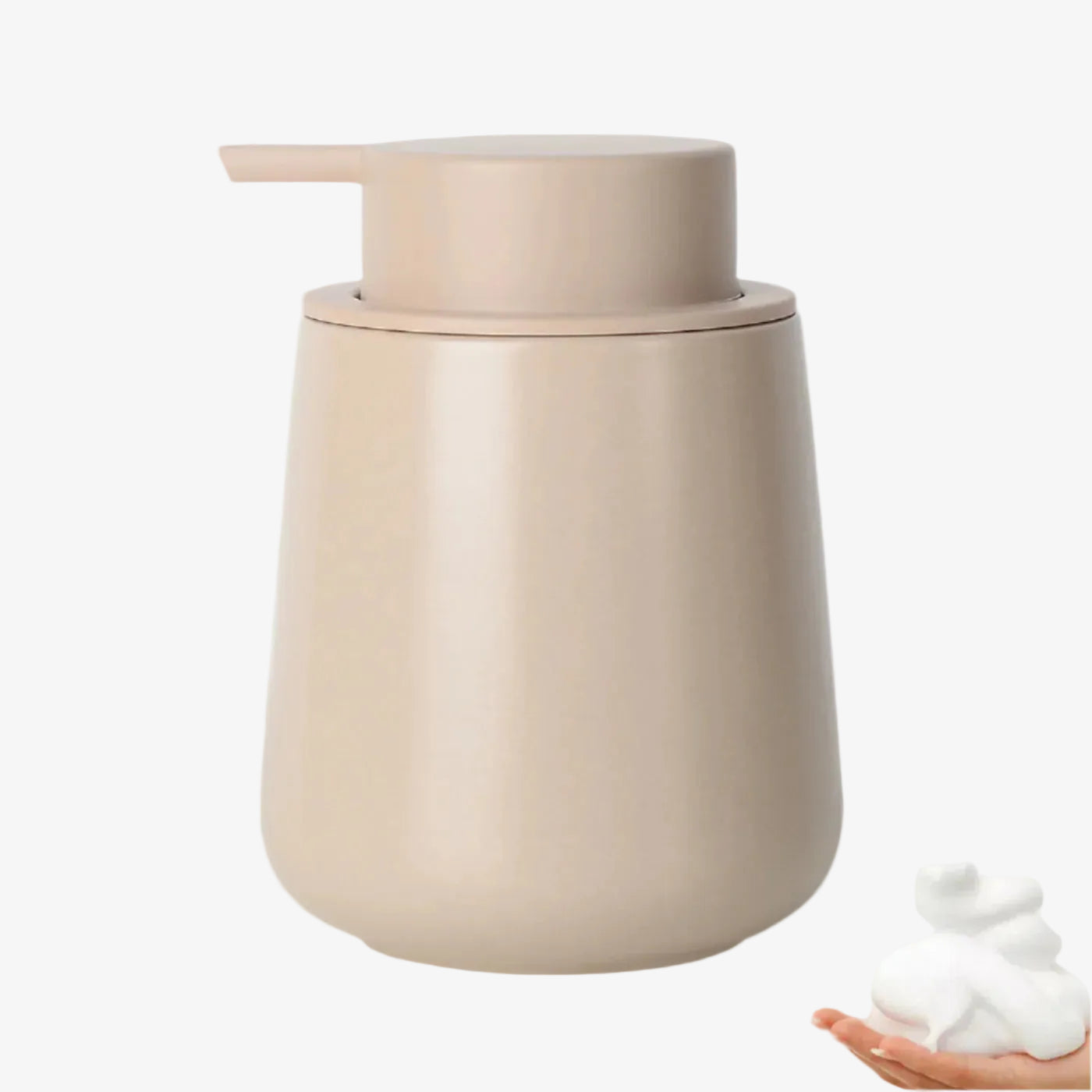 Beige soap dispenser with a small amount of foam on a white background