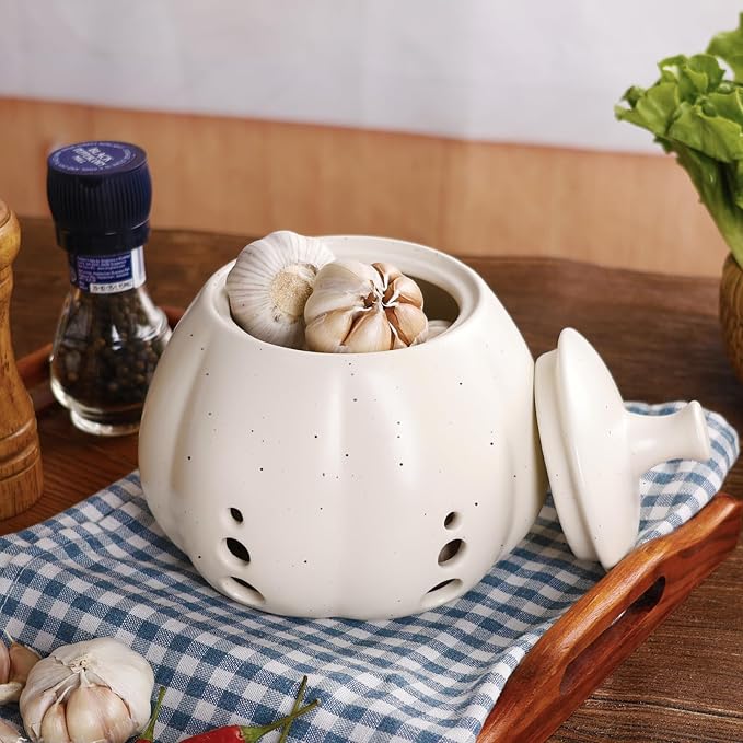 Sustainable ceramic garlic keeper jar in beige, eco-friendly and luxury kitchen storage solution