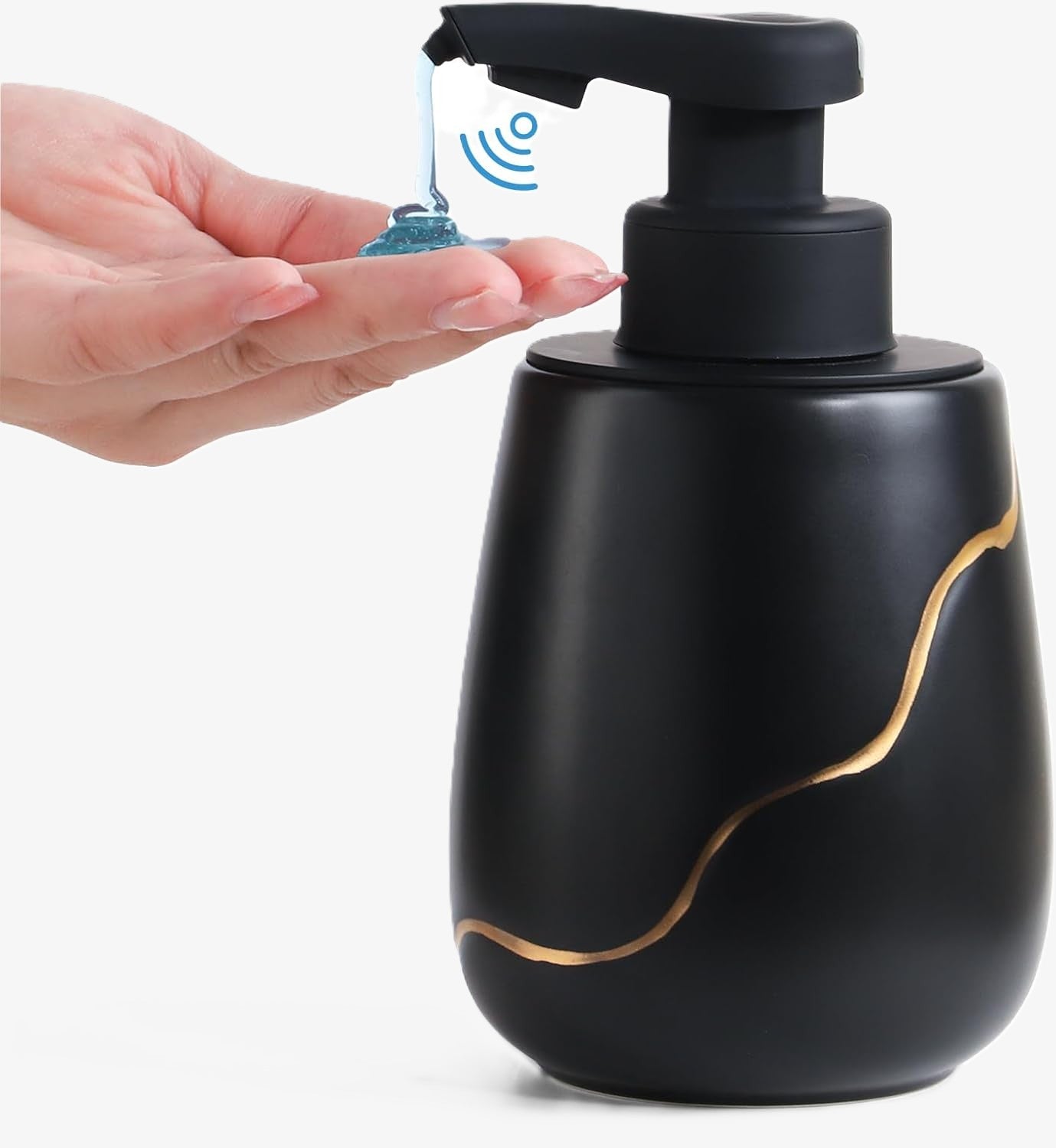 A hand receiving blue liquid soap from the 17 oz BosilunLife automatic touchless dispenser, featuring a matte black recycled eco-clay body with an elegant gold wave design and a hands-free sensor pump.