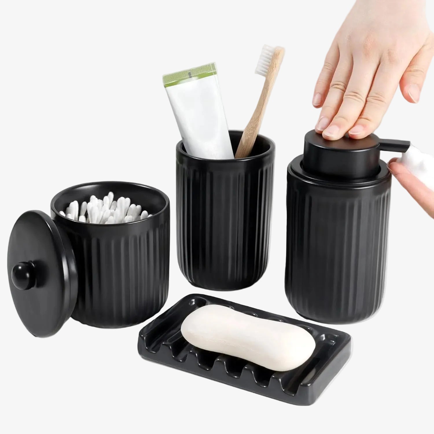 Black bathroom accessory set with containers, soap dish, and toothbrush holder on a white background.