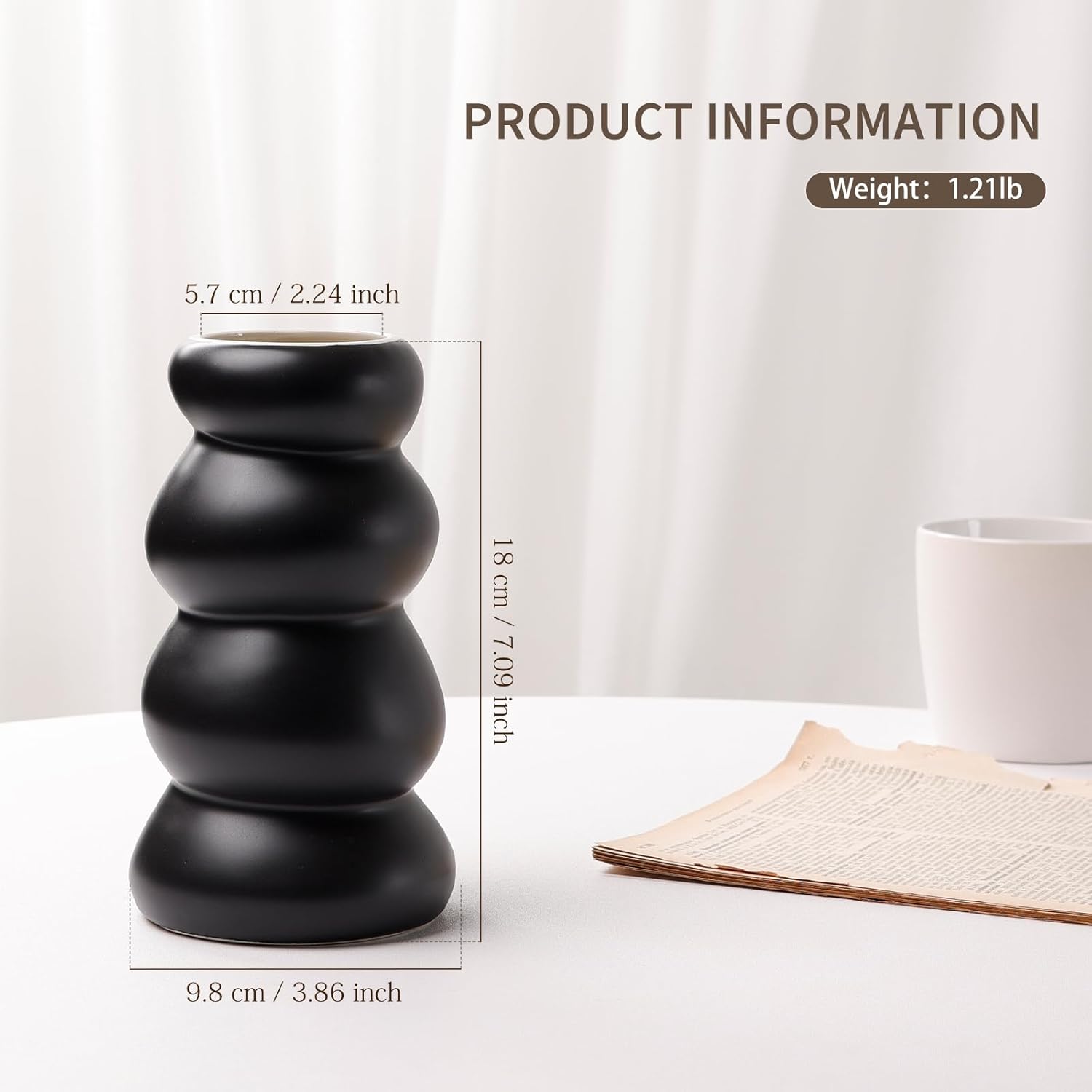 Black decorative vase with measurements and product information on a white background
