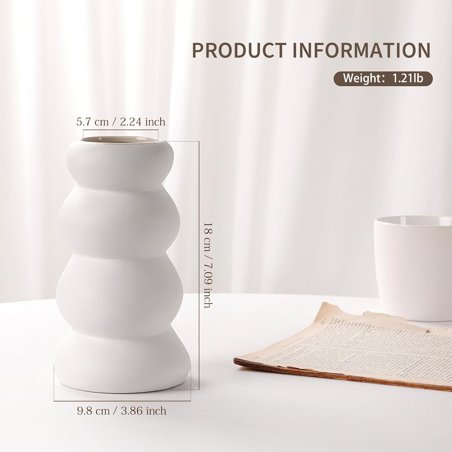 White ceramic vase with product information on a white background