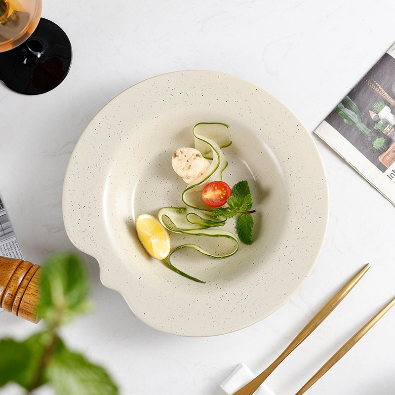 A deep plate with salad