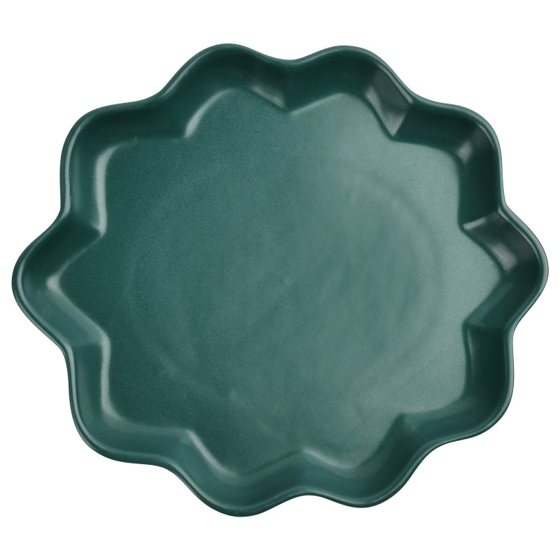 A green ceramic deep dish