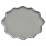 An irregularly shaped gray dinner plate