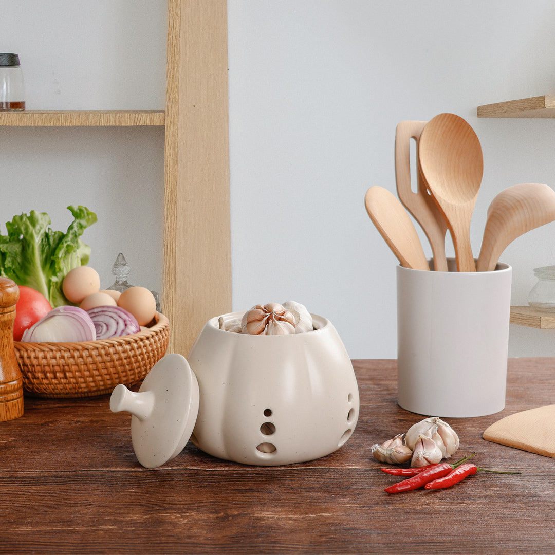 Sustainable ceramic garlic keeper jar in beige, eco-friendly and luxury kitchen storage solution