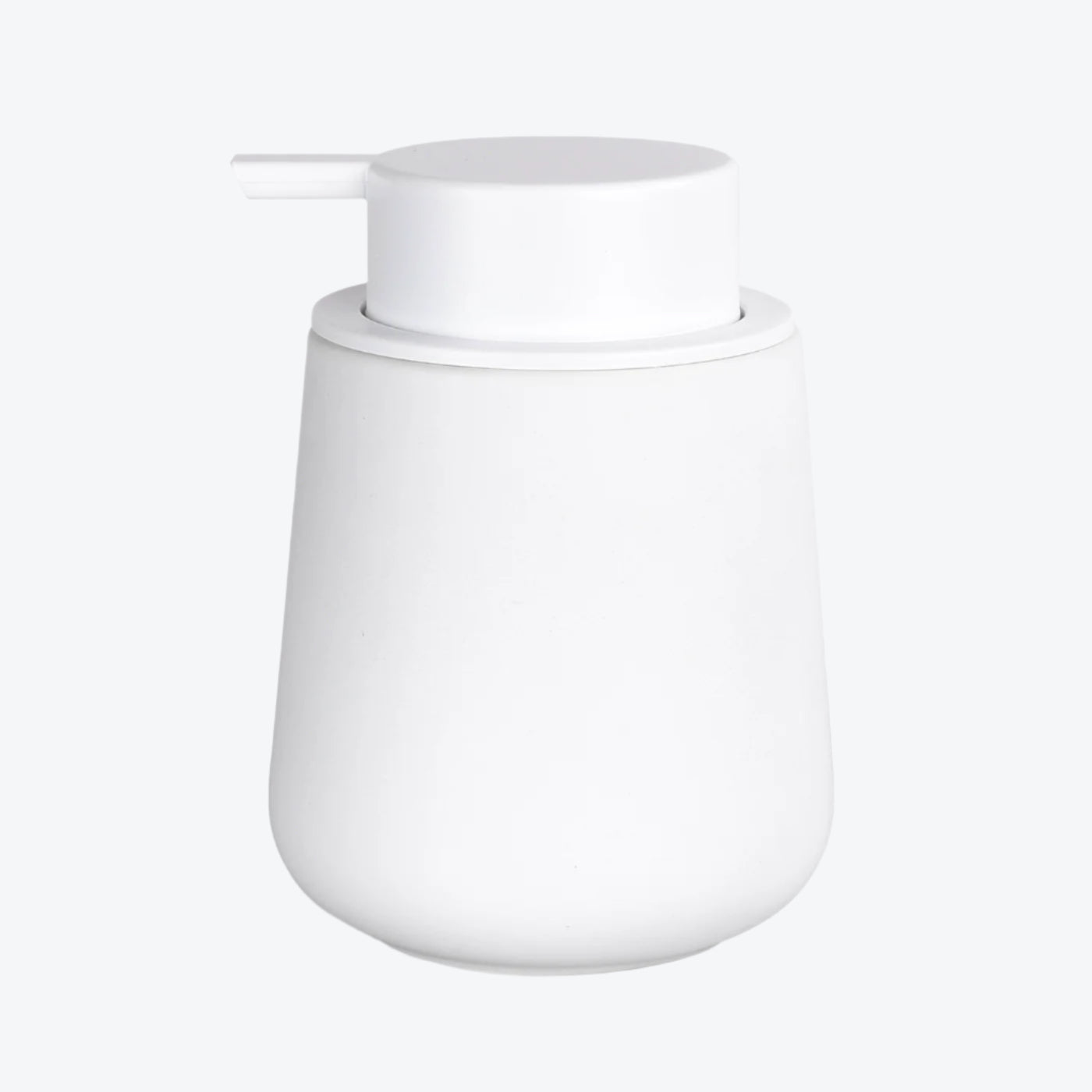 White ceramic soap dispenser on a light gray background