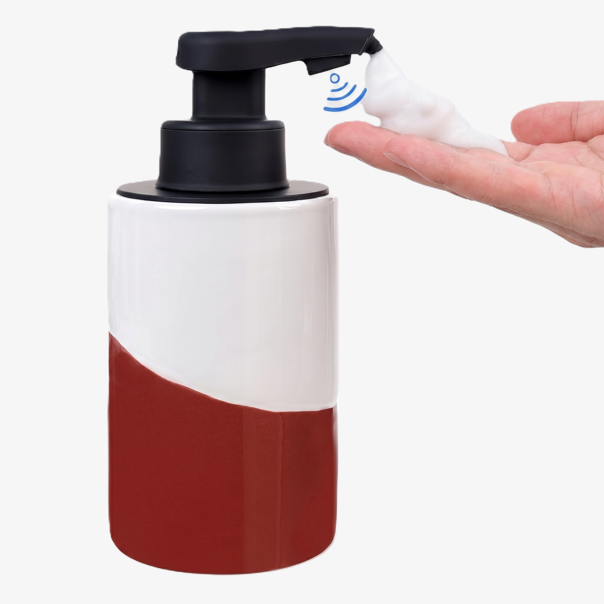 BosilunLife Nordic Garden automatic foaming soap dispenser crafted from recycled eco-clay. The ceramic body features an organic two-tone glaze in gloss white and deep rich red. A matte black touchless sensor pump, highlighted by a blue sensor icon, is shown actively dispensing a thick lather of foaming soap into a waiting hand against a clean white background, showcasing hygienic, hands-free washroom technology.