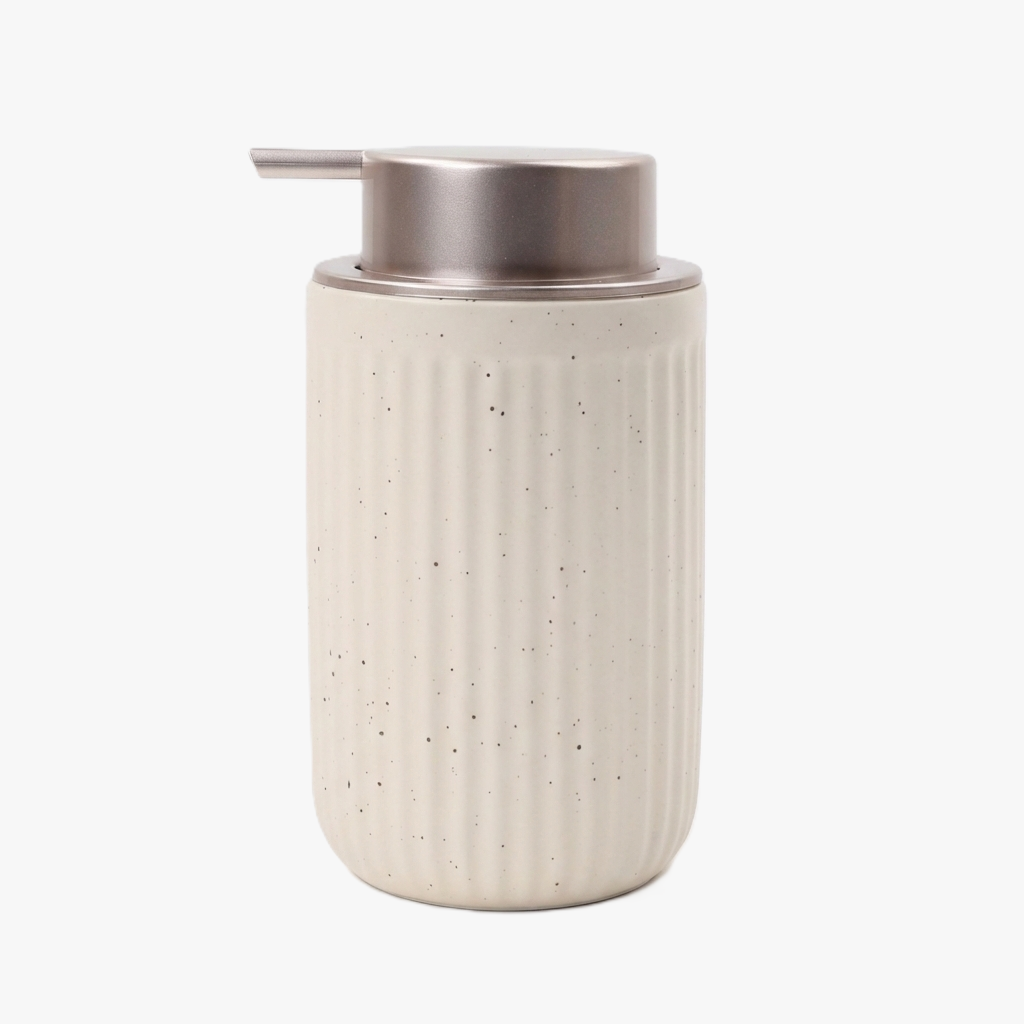 BosilunLife Pockmark 12 oz liquid soap dispenser in apricot speckled recycled eco-clay. Features a vertically ribbed volcanic stone texture with a premium brushed champagne metallic liquid pump, ideal for warm minimalist and organic modern bathroom decor.