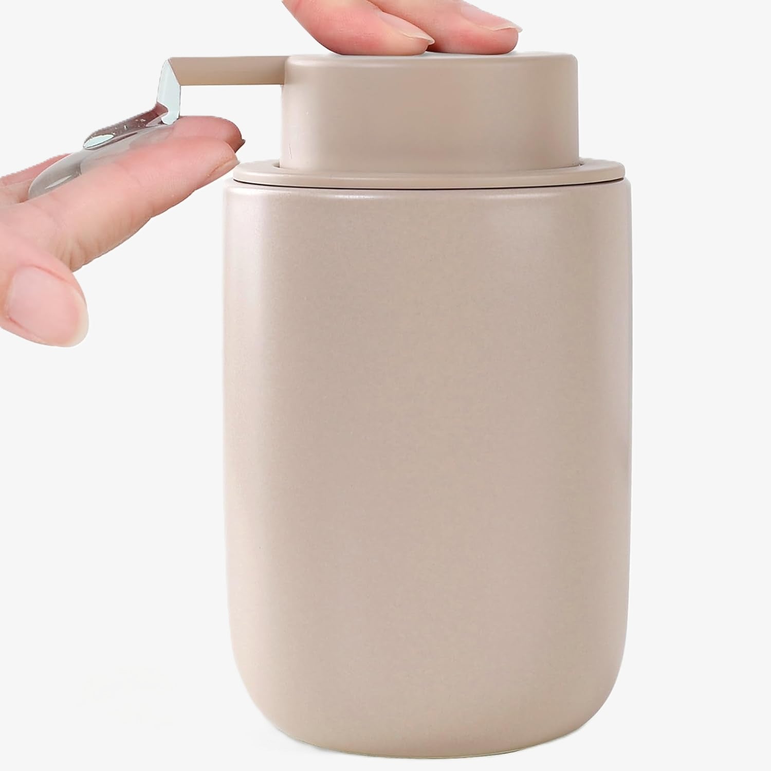 Close-up action shot of the BosilunLife 12 oz (350ml) slim liquid soap dispenser in a monochromatic khaki finish. A hand is shown pressing the matching wide-head matte pump to dispense clear liquid from the slender organic vessel. Crafted from GRS-certified recycled ceramic eco-clay, this space-saving organiser reflects Scandinavian functionality and a commitment to a sustainable circular economy, perfect for narrow washroom vanities and neutral-toned interiors.